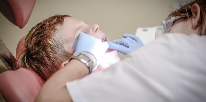 boy on dentist table
